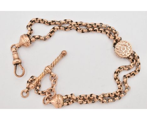 A YELLOW METAL ALBERTINA, belcher chain, with ivy detailed centre link (soldered on one side so does not slide), fitted with 
