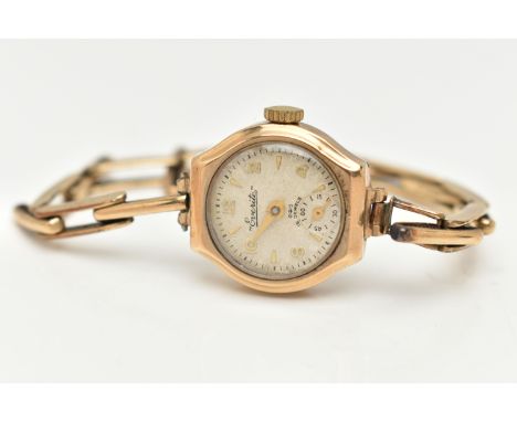 A LADIES 9CT GOLD CASED WRISTWATCH, manual wind, round silver dial signed 'Everite', alternating Arabic numerals and baton ma