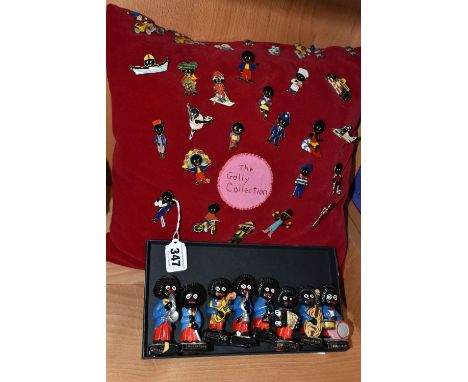 A COLLECTION OF ROBERTSONS JAM FIGURES AND BADGES, comprising eight chalkware jazz band musician figures, and a cushion displ