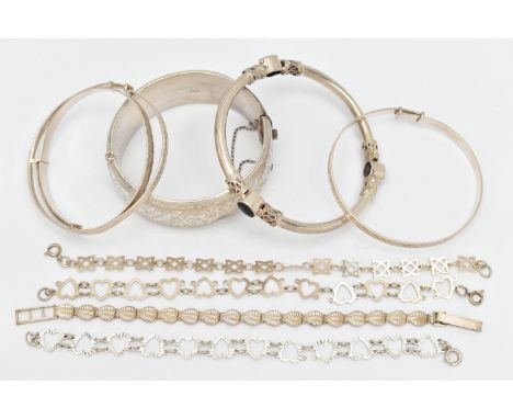 ASSORTED SILVER AND WHITE METAL BRACELETS, to include a wide silver hinged bangle, etched with floral detail, approximate wid