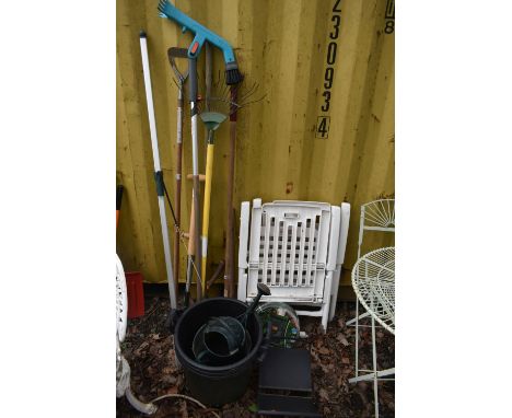 A SELECTION OF GARDEN HAND TOOLS, to include rakes, brushes, etc, along with other garden accessories and two white plastic f