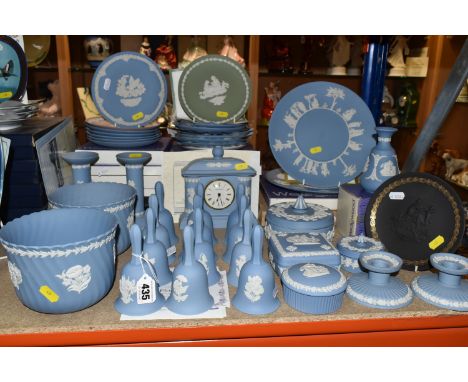 A COLLECTION OF WEDGWOOD BLUE JASPER WARES ETC,  to include twelve bells, pair of dwarf candlesticks, pair of column candlest