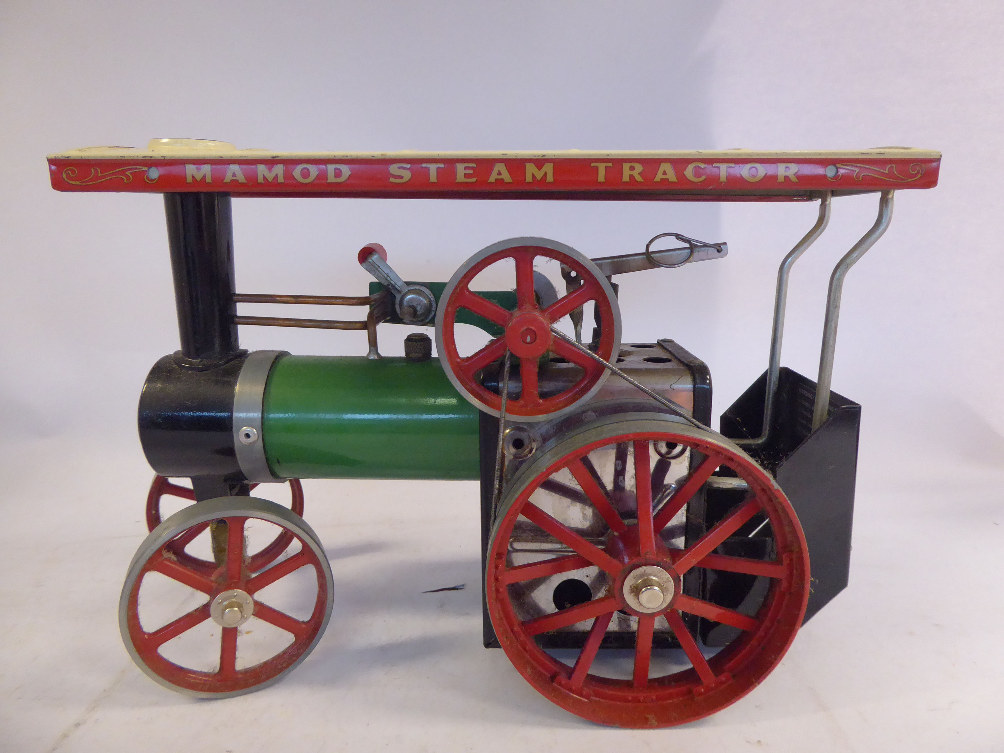 A Mamod live steam model traction engine, in green, red, black and ...