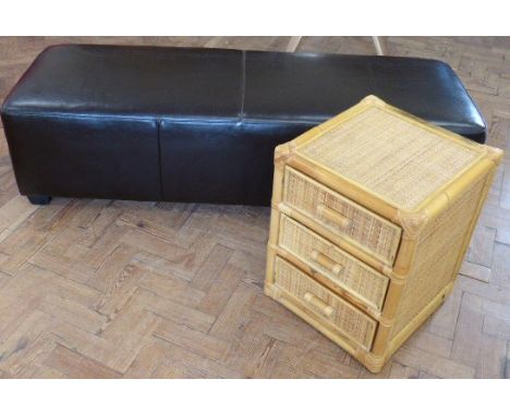 A modern leather pouffe 152cm X 54cm and a wicker/bamboo chest Unfortunately we are not doing condition reports for this sale