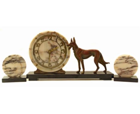 Art deco design French clock garniture, clock decorated with a cast metal figure of a dog Unfortunately we are not doing cond