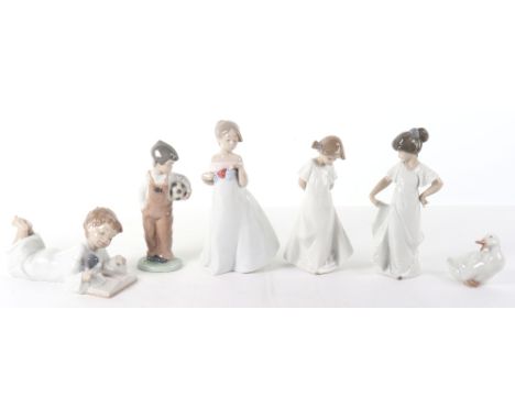 Ten Nao porcelain figures, including Swan, Reading Boy and dog, three girls, boy holding ball, baby with dummy, girl reading,