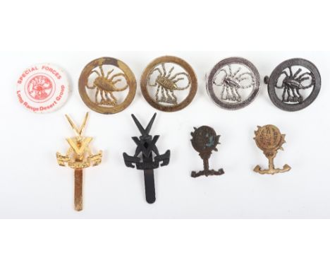 Selection of British Special Forces Badges, including four variations of Long Range Desert Group (L.R.D.G) cap badge, Special