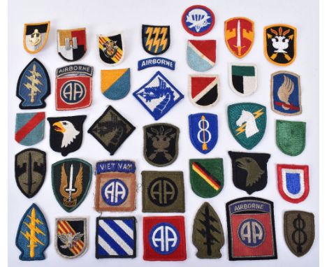 Quantity of American Uniform Patches and Beret Badges, dating from various periods. Some appear to be of Vietnam War vintage.