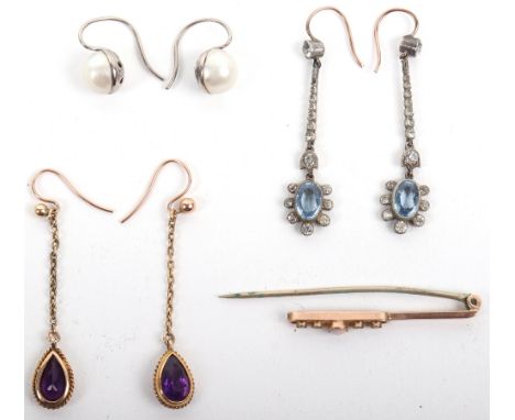 A pair of gold (unmarked) and amethyst drop earrings, a 9ct opal set bar brooch, a pair of paste drop earrings, and a pair of