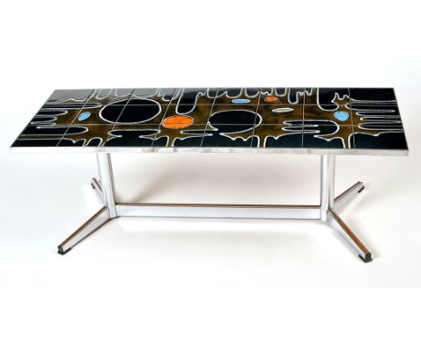 A pottery tiled and chromed metal coffee table, decorated in abstract design, the tiles are probably by Poole Pottery, c.1970