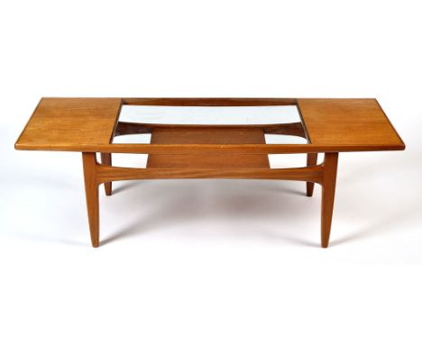 A G Plan fresco teak coffee table, designed by V.B. Wilkins, rectangular with a glass insert to top above a lower magazine sh