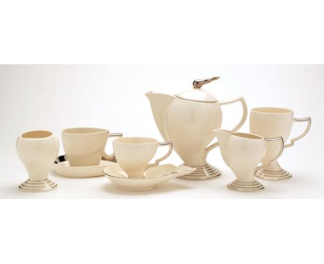 Cosmic Design Works: an Art Deco style part tea and coffee service, comprising: coffee pot, cream jug, sugar bowl, three latt