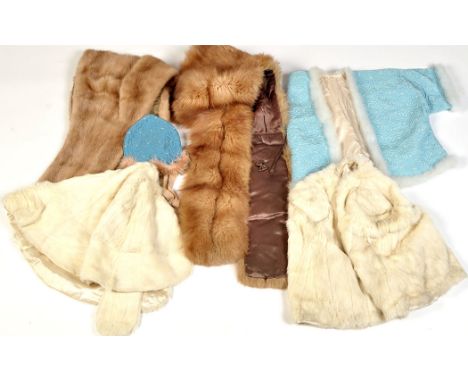 A quilted bed jacket with feather edging and quilted cap; a mink stole; two white fur capes; a fur stole; a wig; hats; etc.