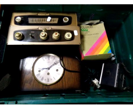 A crate containing Polaroid camera, Bentima eight day mantel clock, Tripletone stereo and receiver  