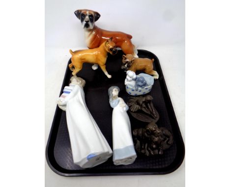 A tray containing ceramic dog figures, three Nao figures, together with two further composite figures, ballerina and puppies 