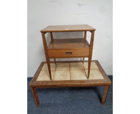 A mid 20th century teak two tier occasional table fitted a drawer together with a further tile topped coffee table  