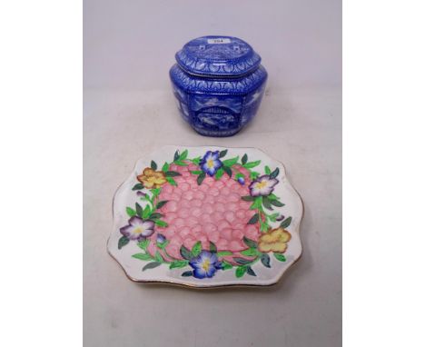 A Maling North East Coast Exhibition Bridges tea caddy together with a Maling floral patterned plate    