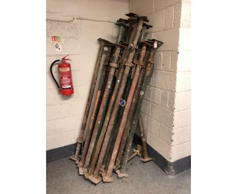 Twenty four builder's extendable props 