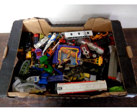 A box containing a large quantity of assorted mid 20th century and later play worn die cast vehicles to include Corgi, Dinky,