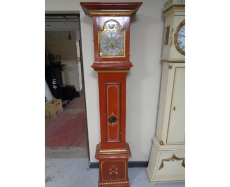 A continental painted longcase clock with brass and silvered dial 