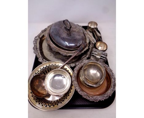 A tray containing antique and later plated wares to include wine coaster, lidded tureen, serving tray, soup ladle etc  