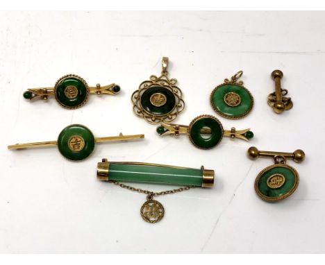 A suite of Chinese 18ct yellow gold jade set jewellery to include two pendants, four bar brooches and pair of cufflinks, most