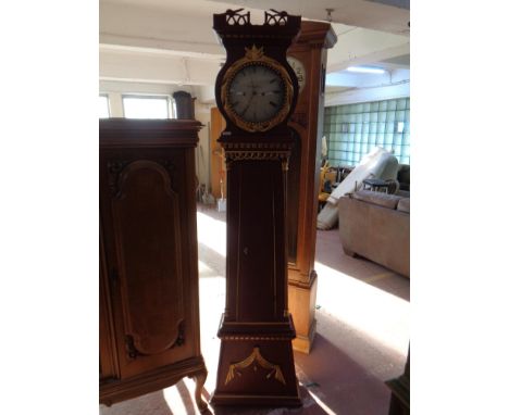 A continental painted longcase clock with circular dial  