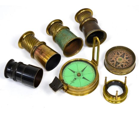 A brass pocket compass, marked 'Elliott Bros, Strand London'; a smaller brass pocket compass; together with a 'Loupe Apodisto