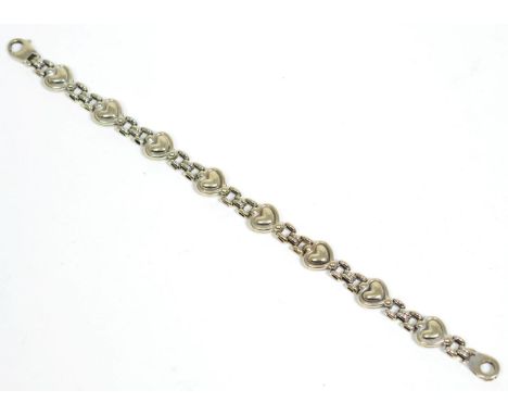 A 9 carat white gold bracelet, formed of heart-shaped and gate pattern links, length 20cm  15.1g