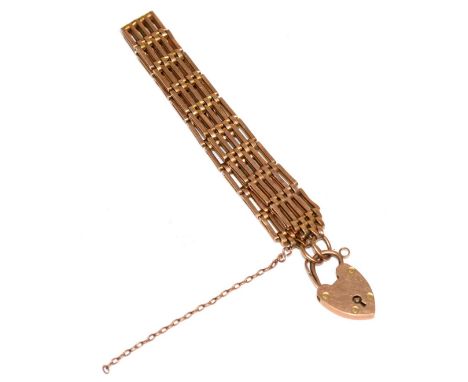 A gate link bracelet with a padlock clasp, length 19cm, stamped '9CT'14.9g