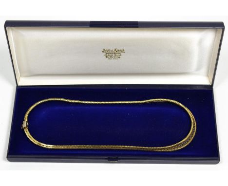 A 9 carat three colour gold necklace, the graduated front with three colour gate links, to a herringbone chain back, length 4
