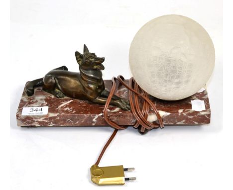 A French Art Deco table lamp with spelter Alsatian on marble slab base