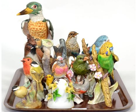 A quantity of Goebel bird models, a Franklin Mint bird bell and a Royal Worcester bird model