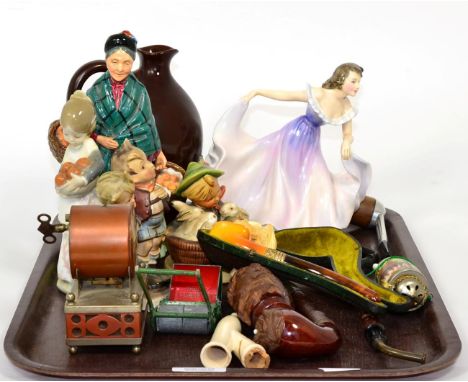 A well carved meerschaum pipe depicting a lady; a Royal Doulton figure ''The Orange Lady''; a Royal Doulton Dewars whisky bot
