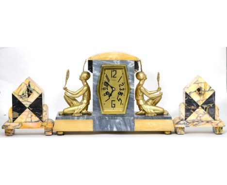 An Art Deco marble striking mantel clock with garniture 