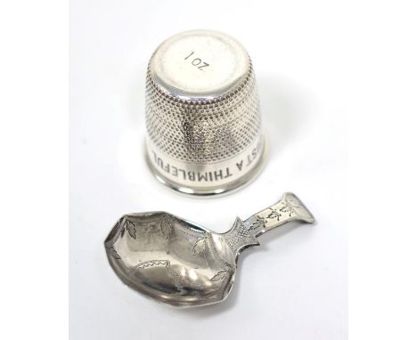 A George III silver caddy spoon, probably John Lawrence, Birmingham 1811, with octagonal bowl and engraved decoration; togeth