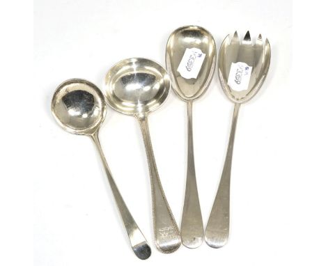 A pair of silver salad servers; a Victorian bead edge sauce ladle; and a George III sauce ladle 