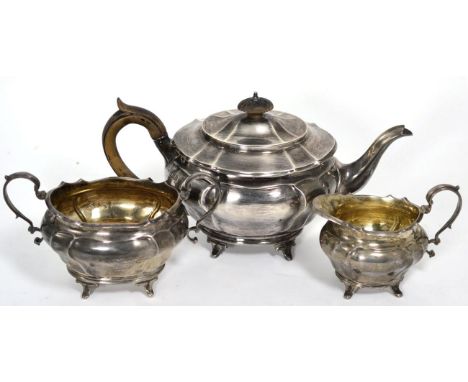 A silver three piece tea service, Charles Stuart Harris, London, 1904