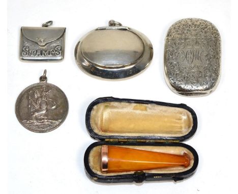 A silver stamp case; a silver snuff box; a silver vesta; a silver medallion; and a cased cheroot holder 