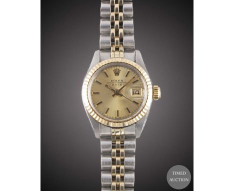 A LADIES STEEL &amp; GOLD ROLEX OYSTER PERPETUAL DATE BRACELET WATCH
CIRCA 1980, REF. 6917 WITH CHAMPAGNE DIAL
Movement:&nbsp