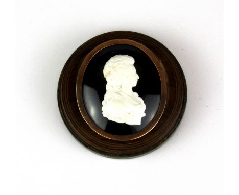 A fine yellow metal mounted Regency portrait cameo mounted in a wooden frame with decorative back, Dia. 6.5cm.