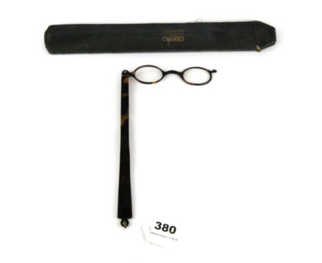 A Victorian folding tortoiseshell lorgnette and case.