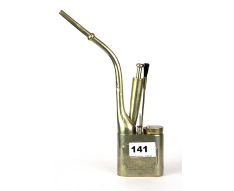 A Chinese metal opium pipe with tools, H. 23cm.