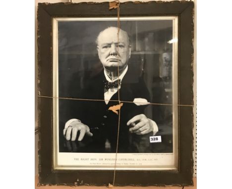 A framed 1954 portrait photograph of Sir Winston Churchill, frame 63 x 52cm.