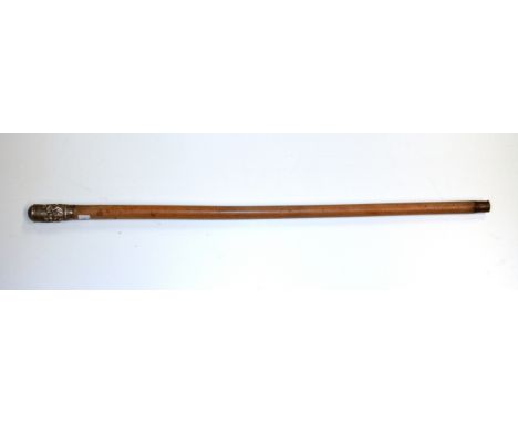 A Siamese 19th century hammered white metal handled walking stick, handle L. 8.5cm.