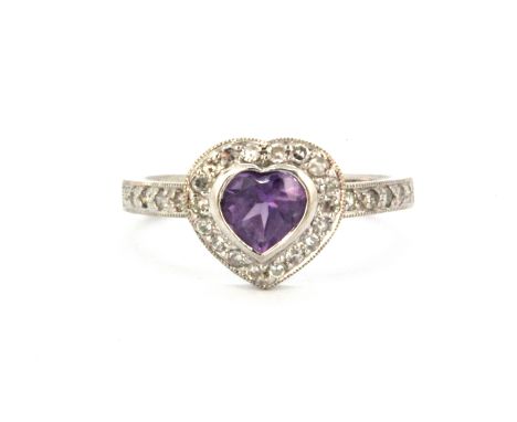 A 9ct white gold heart shaped cluster ring set with heart cut amethyst surrounded by brilliant cut diamonds and diamonds set 