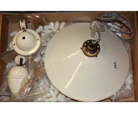 An interesting ceramic pull down ceiling light and pulley, Dia. 35cm.