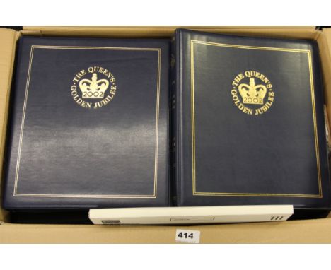 A large quantity of albums of the Queens Golden Jubilee commemorative first day cover stamps with coins.
