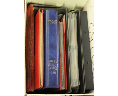 A box of mixed stamp albums and loose stamps, first day covers etc.