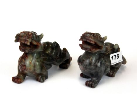 A pair of Chinese carved jade/ hardstone dragon figures, L. 14cm H. 10.5cm.
